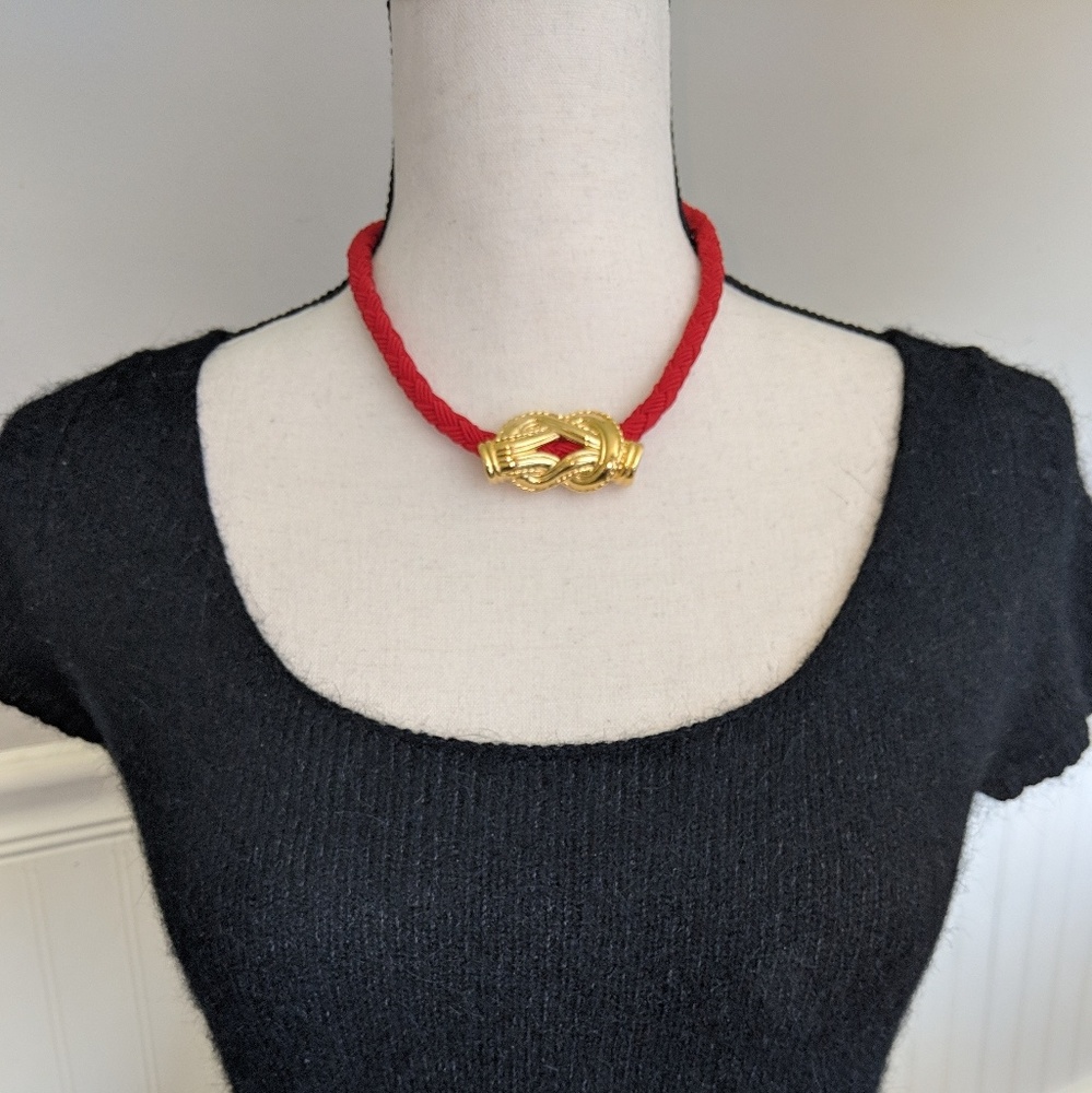 Unique red braided red rope necklace, gold detail